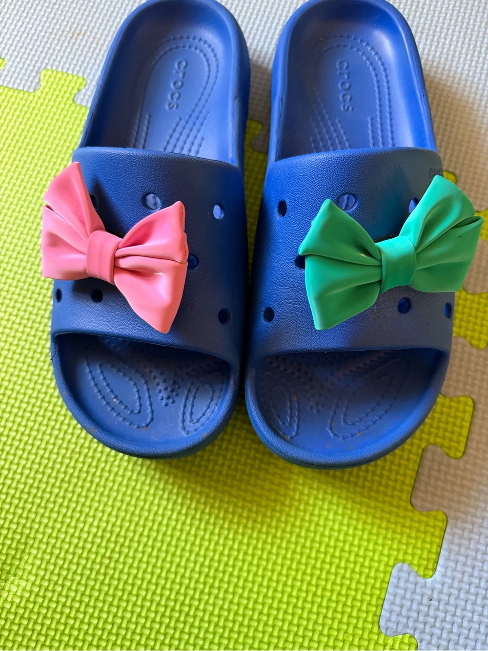 CROCS Navy Slide Sandals with Pink and Green Bows